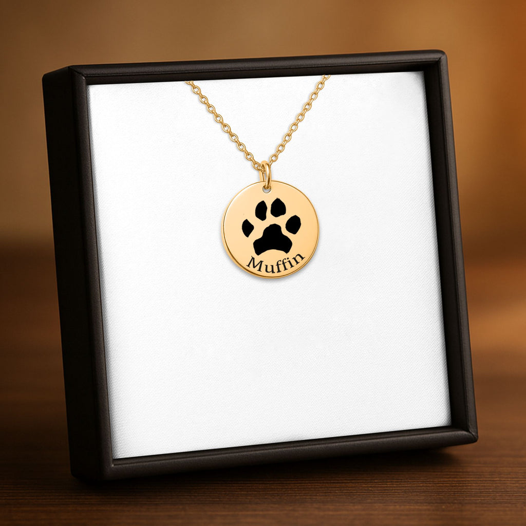 Collar dorado con la huella de tu mascota grabada, en su caja de regalo